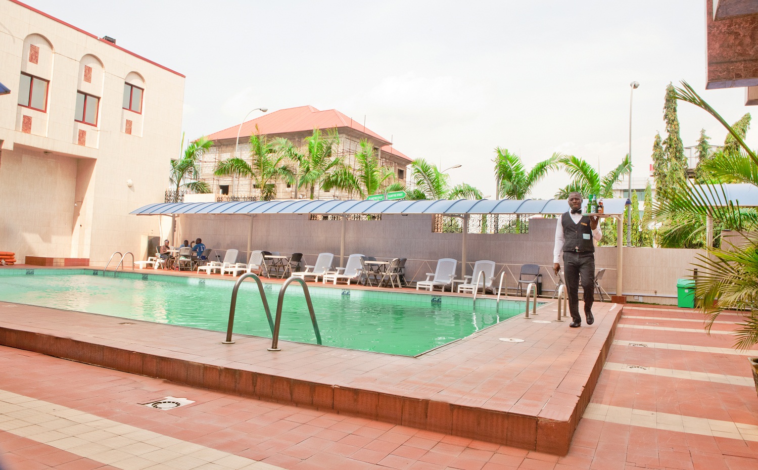 Outdoor pool area of Valencia Hotel Abuja
