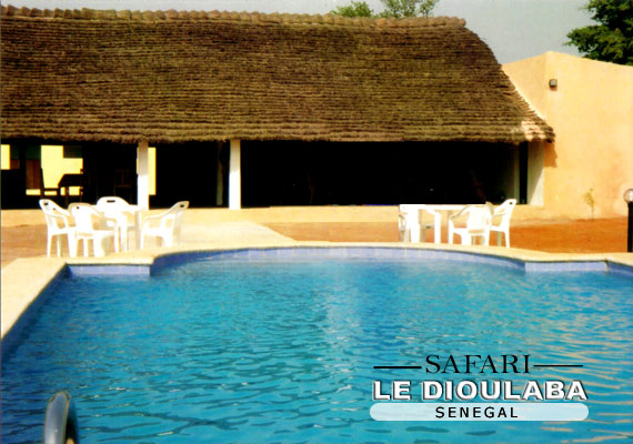 Outdoor pool area of Le Dioulaba
