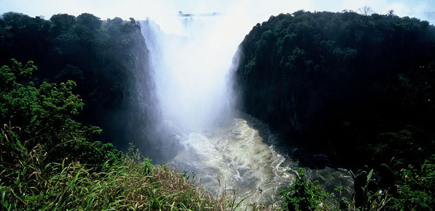 Mist coming off a large waterfall - The Best Of Botswana