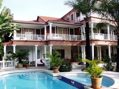 Outdoor pool area of Coconut Residence