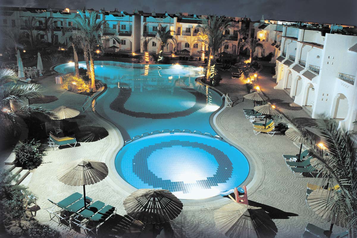 Outdoor pool area of Dive Inn Resort