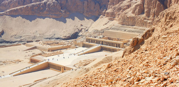 People walking along an ancient site in Egypt - Archeological Tour of Egypt & Algeria