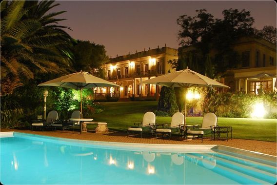 Outdoor pool area of Fairlawns Boutique Hotel