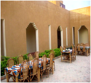 Outdoor dining area of Hotel Dar Salam