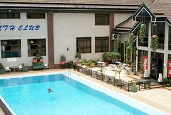 Outdoor pool area of Hotel Equatorial Kampala