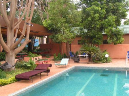 Outdoor pool area of Hotel Residence La Palmeraie