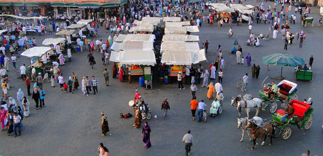 A busy outdoor market place - Discover Morocco