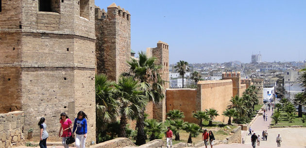 People walking along historic sites in Morocco - Imperial Cities Tour Of Morocco