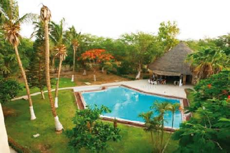 Outdoor pool area of Mame Coumba Bang Hotel