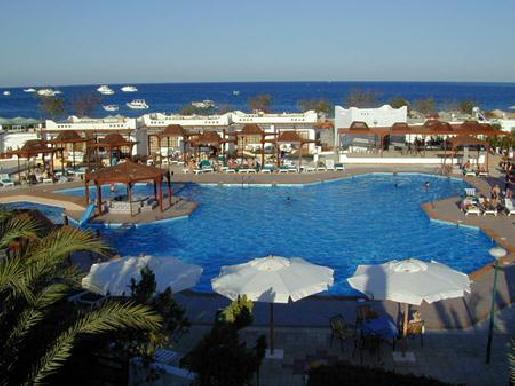 Outdoor pool area of Menaville Hotel