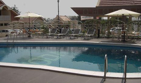 Outdoor pool area of Noda Hotel