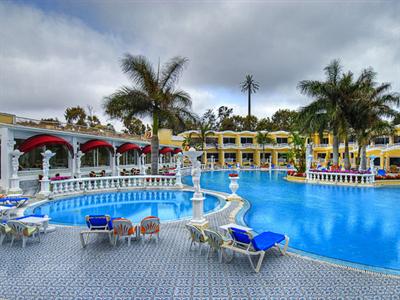 Outdoor pool area of Paradise Inn Beach Resort