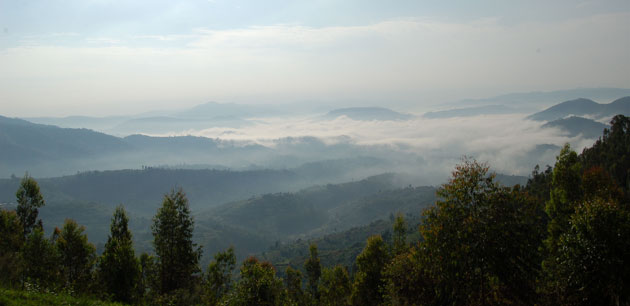 View of rolling hills from a mountain top - Discover Rwanda