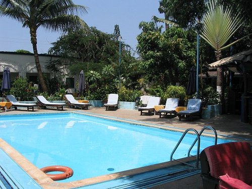 Outdoor pool area of Safari Garden Hotel Fajara