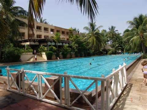 Outdoor pool area of Hotel Jardin Savana Dakar