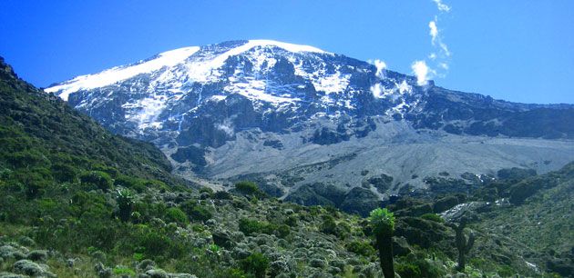 A large mountain covered with snow - Kilimanjaro Climb - Via Western Breach Route